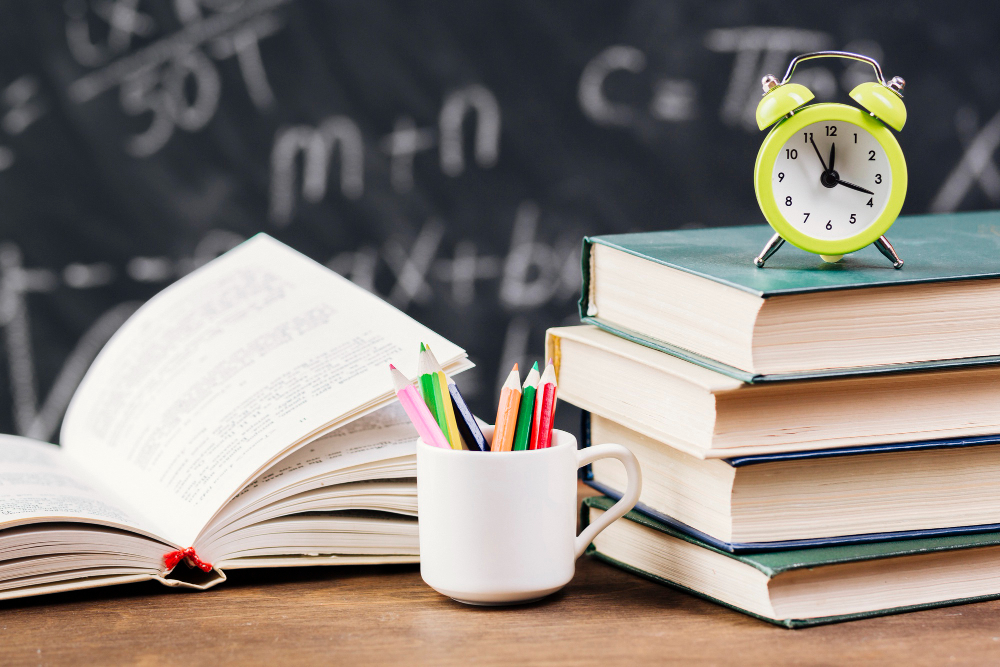 Image by <a href='https://www.freepik.com/free-photo/clock-top-textbooks-teacher-desk_4892743.htm#query=curriculum&position=8&from_view=keyword&track=sph&uuid=2993c3ec-38f1-4ea3-93ef-208913677dc3'>Freepik</a>